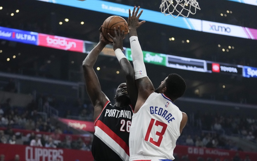 aoa体育体育亚洲官网-快船客场力克开拓者保持领先